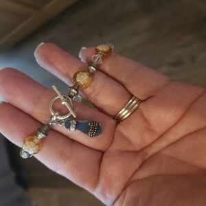 Elegant Beaded Bracelet with Blue Shoe Charm